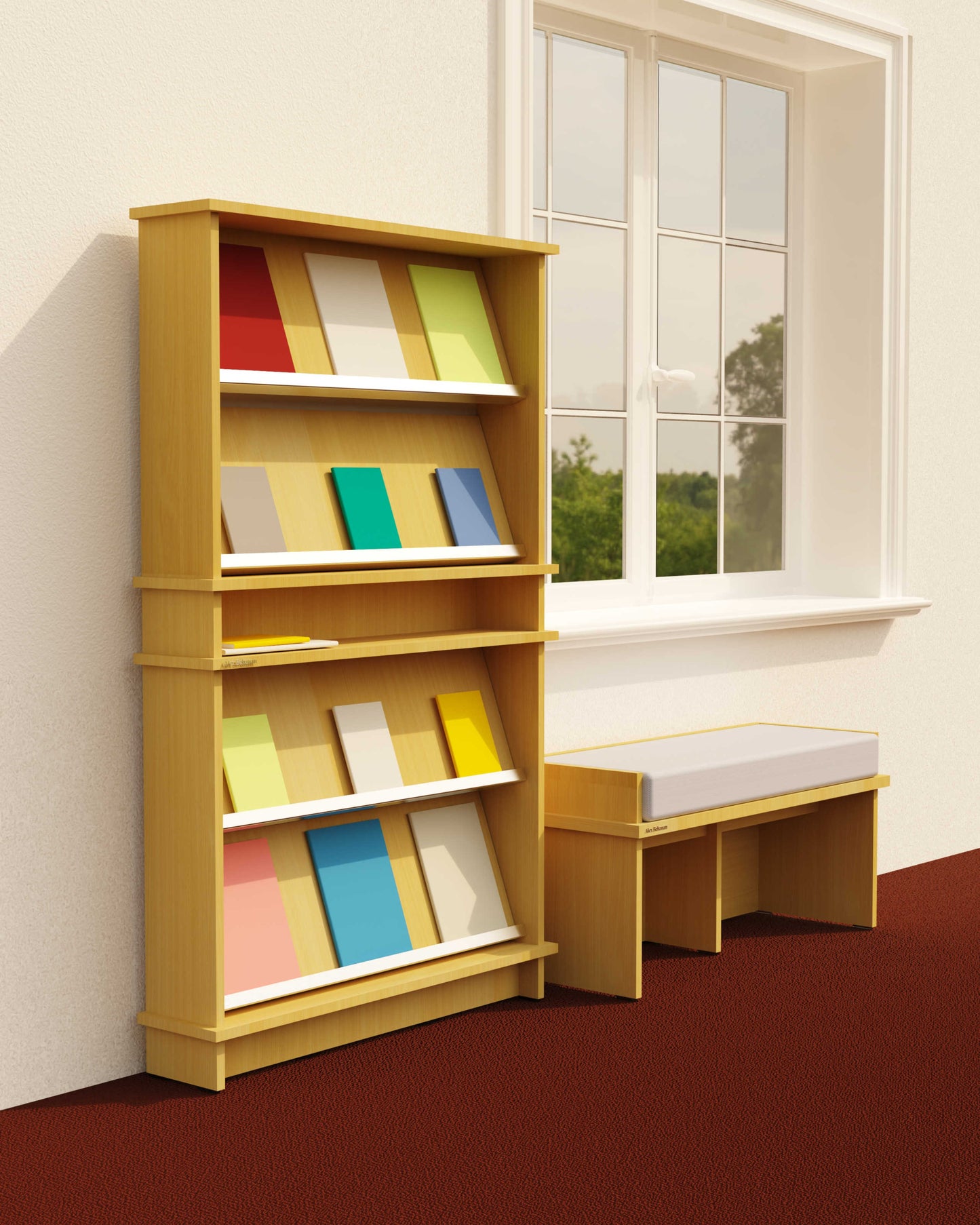 Wooden bookshelf with colorful books next to a small desk with a cushioned seat in a room with a window.